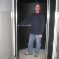 Gary Sutton, Sylvania’s bond program manager, shows off the newly renovated photography lab which includes a spinning door to the dark room.