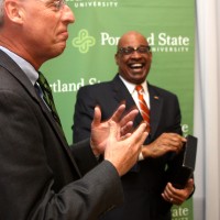 After exchanging gifts, the two presidents share a light moment after the signing.