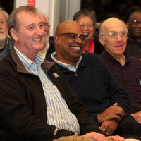 Left to right, PCC Board member Gene Pitts and District President Preston Pulliams enjoy the town hall at the Southeast Center.