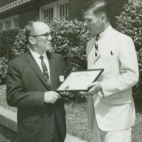 Founding president Amo DeBernardis with young U.S. Sen. Mark Hatfield.