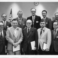Dr. DeBernardis (far left, first row) and his leaders in the early days of PCC.