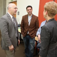 Brad Avakian (left) visits with PCC staff at Willow Creek in May.