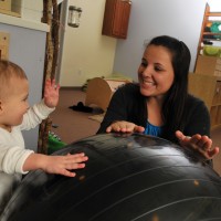 Christina Unga's commitment to environmentally conscious living is apparent at every turn. Toys are made from wood, soft fabric or natural resources. Cribs, bouncy seats and other contraptions that bind babies won’t be found.