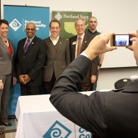 PCC Government Relations Manager Rob Wagner snaps a cell phone picture of the group.