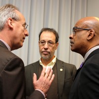Wim Wievel (left) talks with Michael Dembrow and Preston Pulliams.