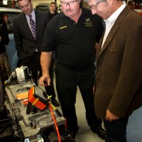 Schrader checks out the voltage of PCC's Toyota Prius mock up.