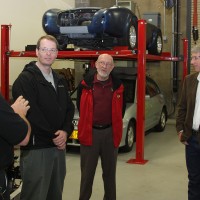 Industry reps Todd Weedman (second from left) and Jim Houser also gave insight on Schrader's tour.