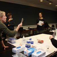 PCC instructor Trish Willy (left) gives the group some instructions before they start the test. Stuart Roberts, Naomi Allan and Cheryl Bondurant listen.
