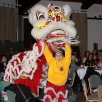 Lion dancers head into the audience.
