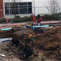 Crews install new fire water line that will service Mt. Tabor and the new students commons and learning commons buildings.