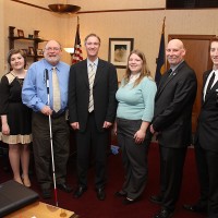 During winter term, student legislative interns visited with State Treasurer Ted Wheeler (middle). Interns include, left to right, Nicole Cathcart, Grace Morlock, Bill Buck, Lexi Bass, Michael Mikeworth, and Patrick Stupfel. Not pictured: Audric Perger.