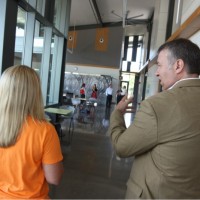 Karen Jones gives Brown a tour of the sustainability features of Newberg Center. After some refreshments and a meet-and-greet with students and staff, he is on his way to Hillsboro Center.