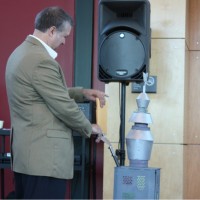 Jeremy Brown received a warm welcome at Sylvania. Here, he gets a special present from a robot. The gift is a 3-D etched picture of himself done on an auto machine tool.