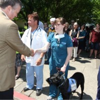 Jeremy Brown takes some time to meet students and staff at Rock Creek. This included staffers of the canine kind, too.