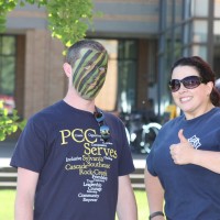 Cascade Fire Protection Program student Lauren Allen (right) helped man the fire hose demonstration near the Student Services Building.