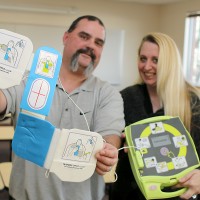 James and Indy Lucas of Corbett use a children’s book they’ve written and published in 2010 titled, “An Adventure with Ed the AED,” to educate children in grade schools on how an Automatic External Defibrillator works and how to find one in case they see a person in cardiac arrest.