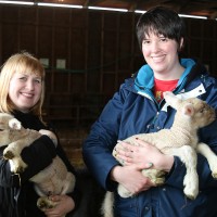 Left to right, BAMZA students Ann Lauerman and Alisha Harvey with new lambs.