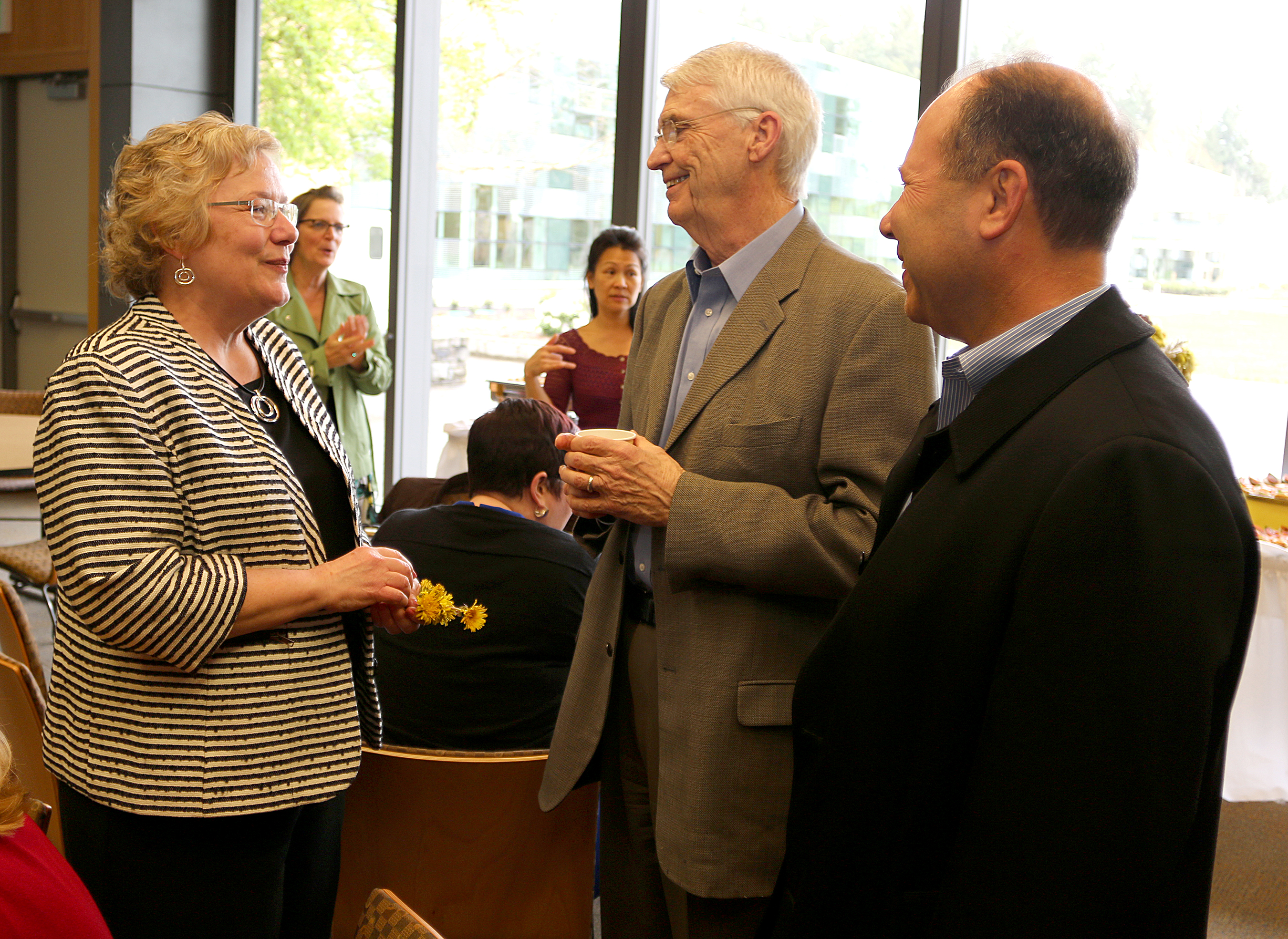 Fowler-Hill talks with PCC Board members Jim Harper (center) and Ken Madden.