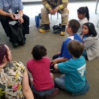 A Fire Protection instructor and student share their stories with first graders.
