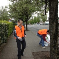 Cleaning along the SE 82nd Avenue parade route was a priority for volunteers.