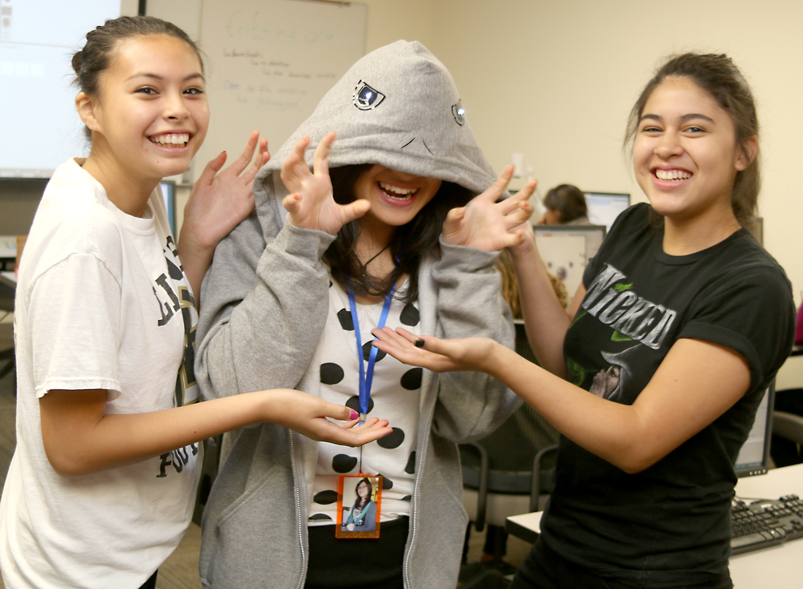 Miranda O. Salinas (left) of West Linn High School and Ariana Rivera of Hillsboro’s Century High School were part of the Wearable Tech Summer Camp at the Sylvania Campus’ MakerSpace in August. Fellow camper Madeline Pitoby is wearing the hoodie.