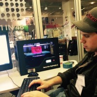 Eric Thomas works his magic during a recent hackathon.