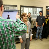 Congresswoman Suzanne Bonamici is scanned by Ben Hill at the MakerSpace for a 3D modeling.