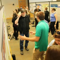 Attendees, which included staff and faculty from PCC and elsewhere, got a chance to view poster summaries of the research projects and chat with the students about their findings.