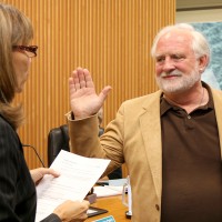 Michael Sonnleitner is sworn into service by Interim PCC President Sylvia Kelley in July. He has an extensive history of service not only at the college but within the community.