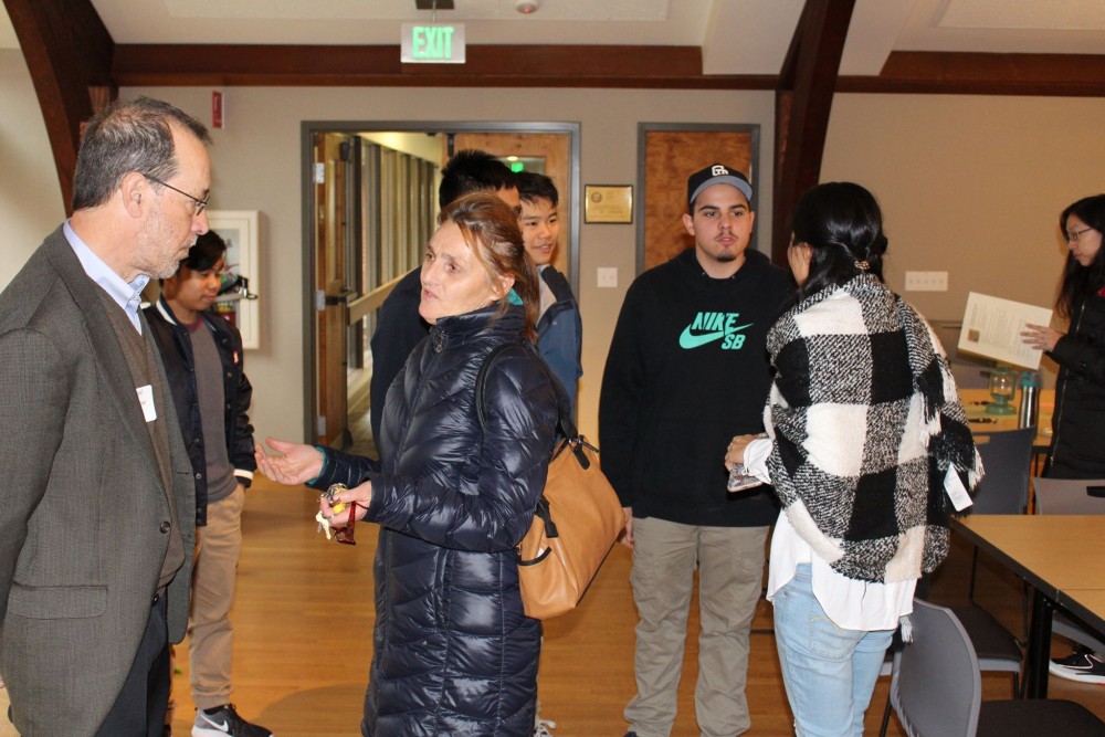 Senator Dembrow takes individual questions from ESOL students after addressing the whole crowd.