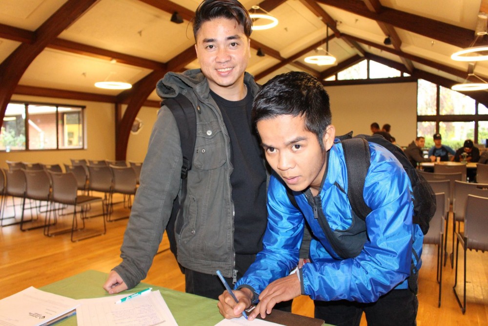 PCC Students sign in to take part in the Conversation Cafe with guest speaker State Senator Michael Dembrow.