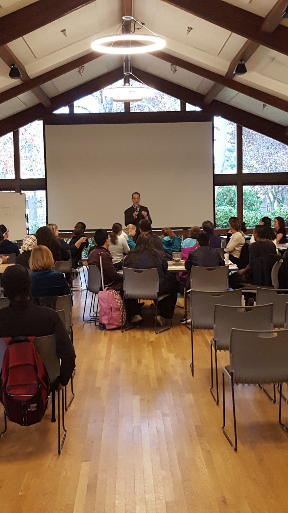 Senator Dembrow addressing the crowd gathered at Conversation Cafe.
