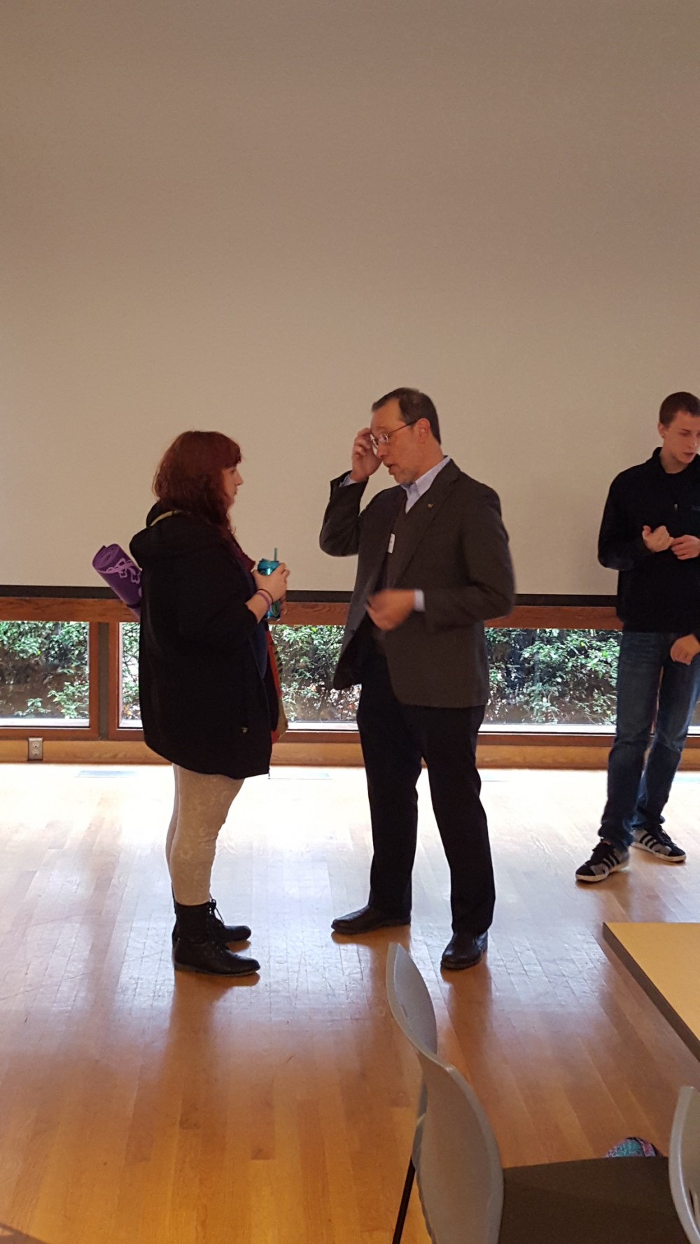 Senator Dembrow speaks with student directly.