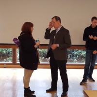 Senator Dembrow speaks with student directly.