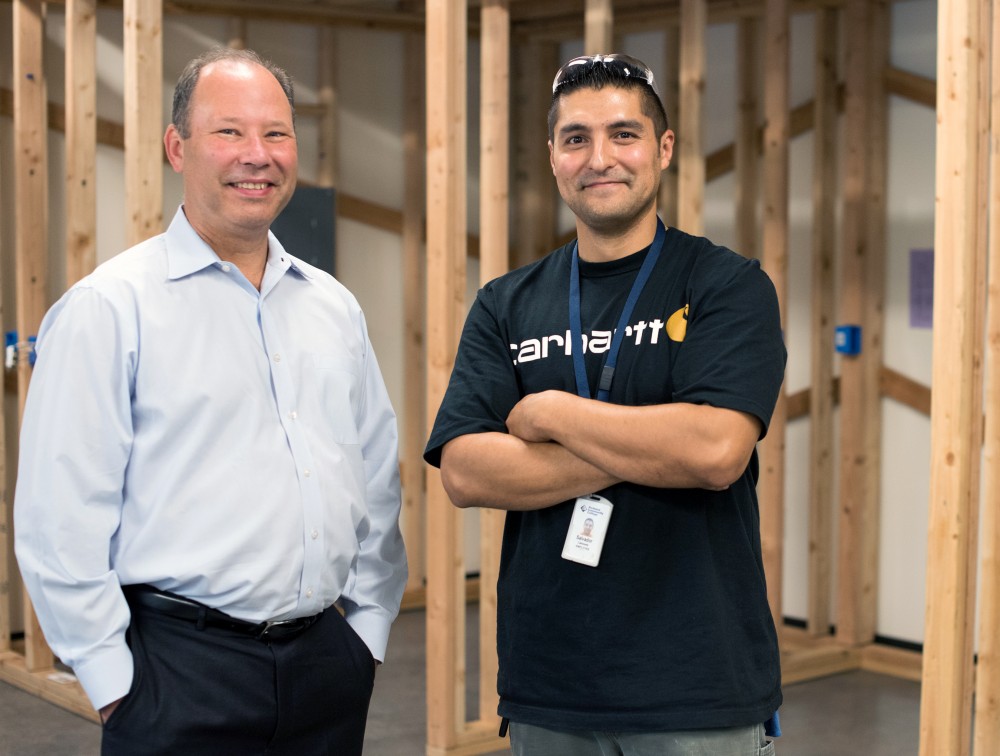 For PCC Board Trustee Ken Madden (left) and his family have supported the construction of the new Swan Island Trades Center and created an endowed scholarship for students in the Building Construction Technology Program.