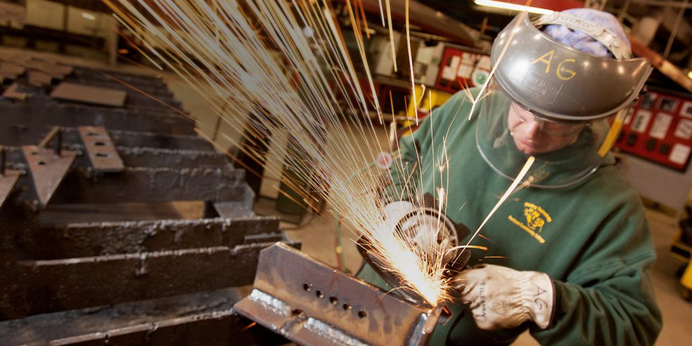 Welder working and sparks flying