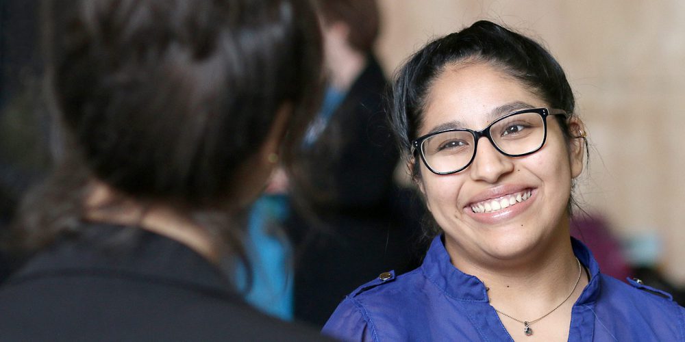 Woman of color student smiling at Day at the Capitol