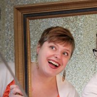 Students taking a selfie at the ceremony
