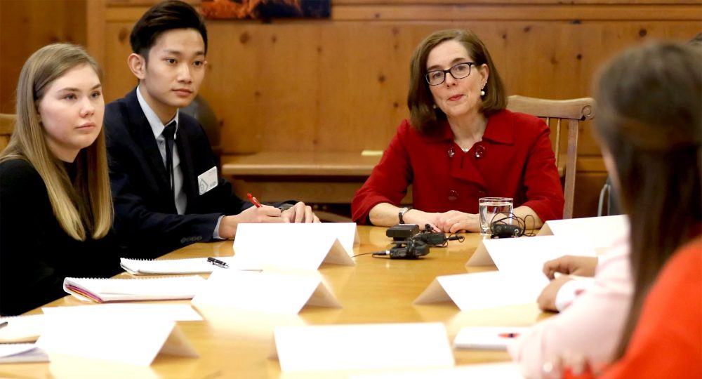 Kien Troung and Gov. Kate Brown.