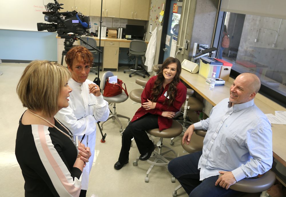 KGW anchor Tracy Barry (left) chats with Dentist Dr. April Love, PCC graduate Kayla Roxey and student Shawn Montgomery.