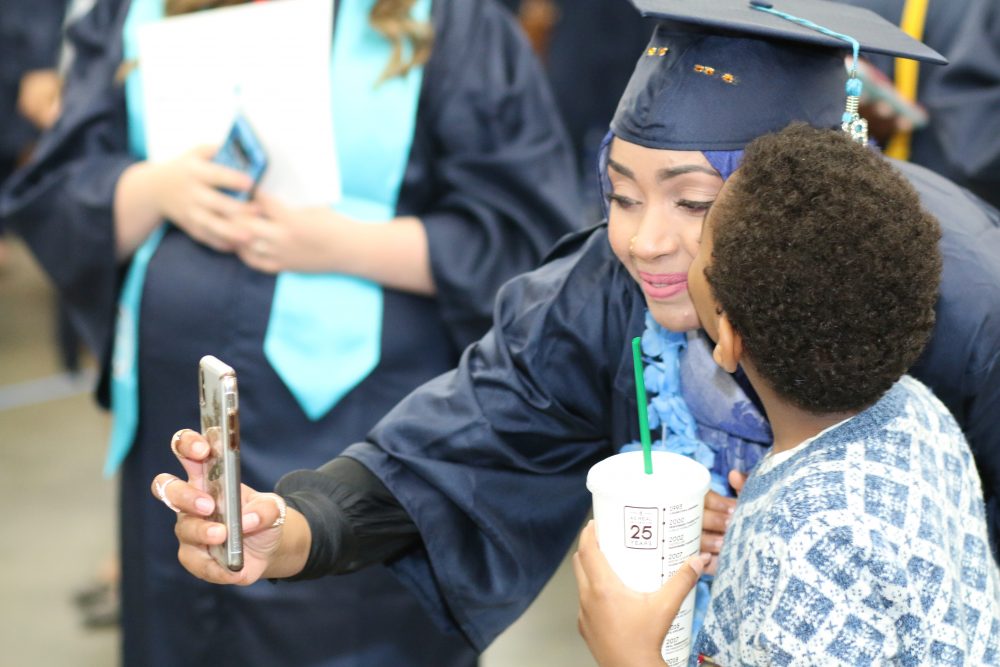 A mother and her child capturing a special moment.