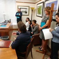 Emma Kallaway takes notes at leg visit.