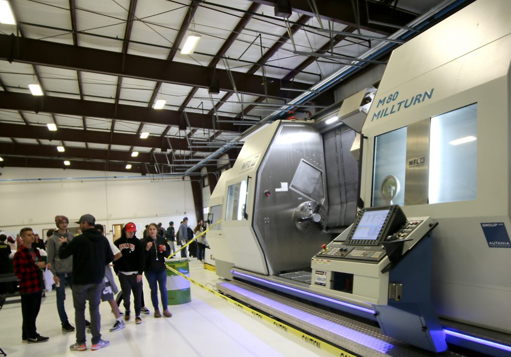 A giant automated millturn worked on machining projects on its own while students watched.