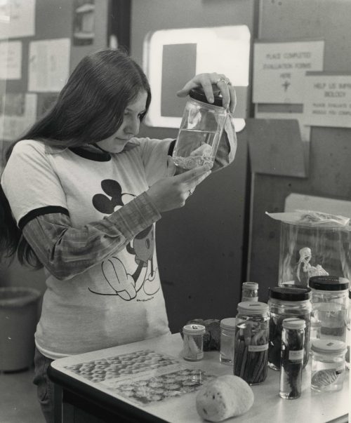 Biology student checking out a specimen.