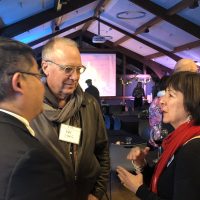 Donor Carol Lyons talks to Mark Mitsui.