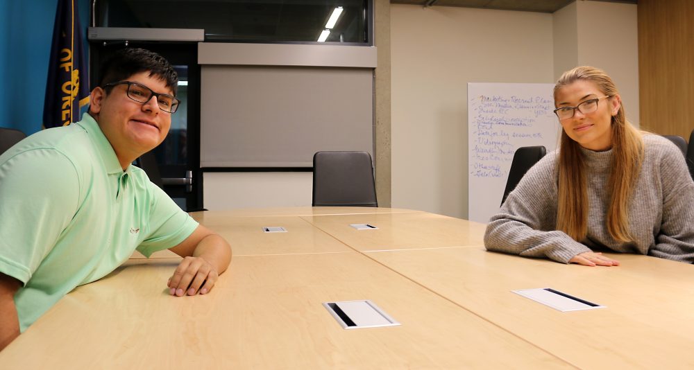 Elsa Van Ornum and Anthony Schaw inside the college's board room.