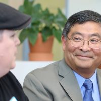 Mark Mitsui meets with students.