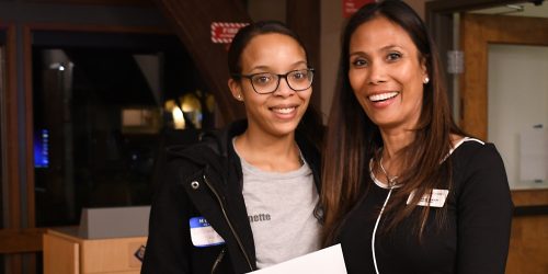 two contractors pose.