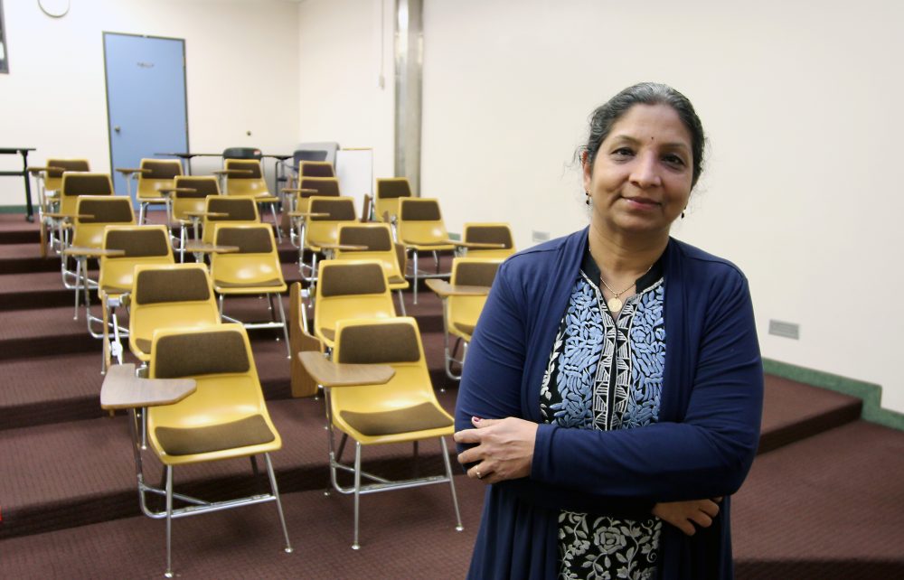 Usha in front of her classroom.