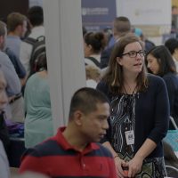 Job fair scene, people everywhere